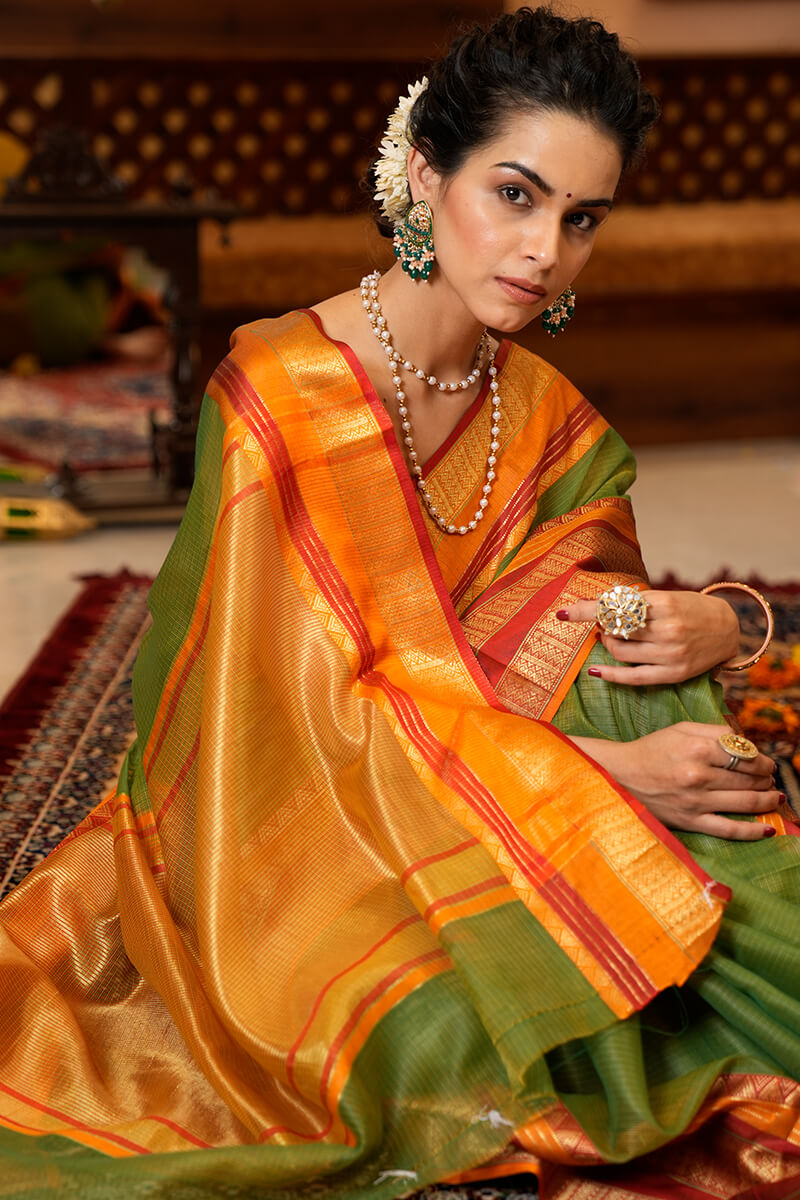 Conflate Green Soft Silk Saree With Fantabulous Blouse Piece