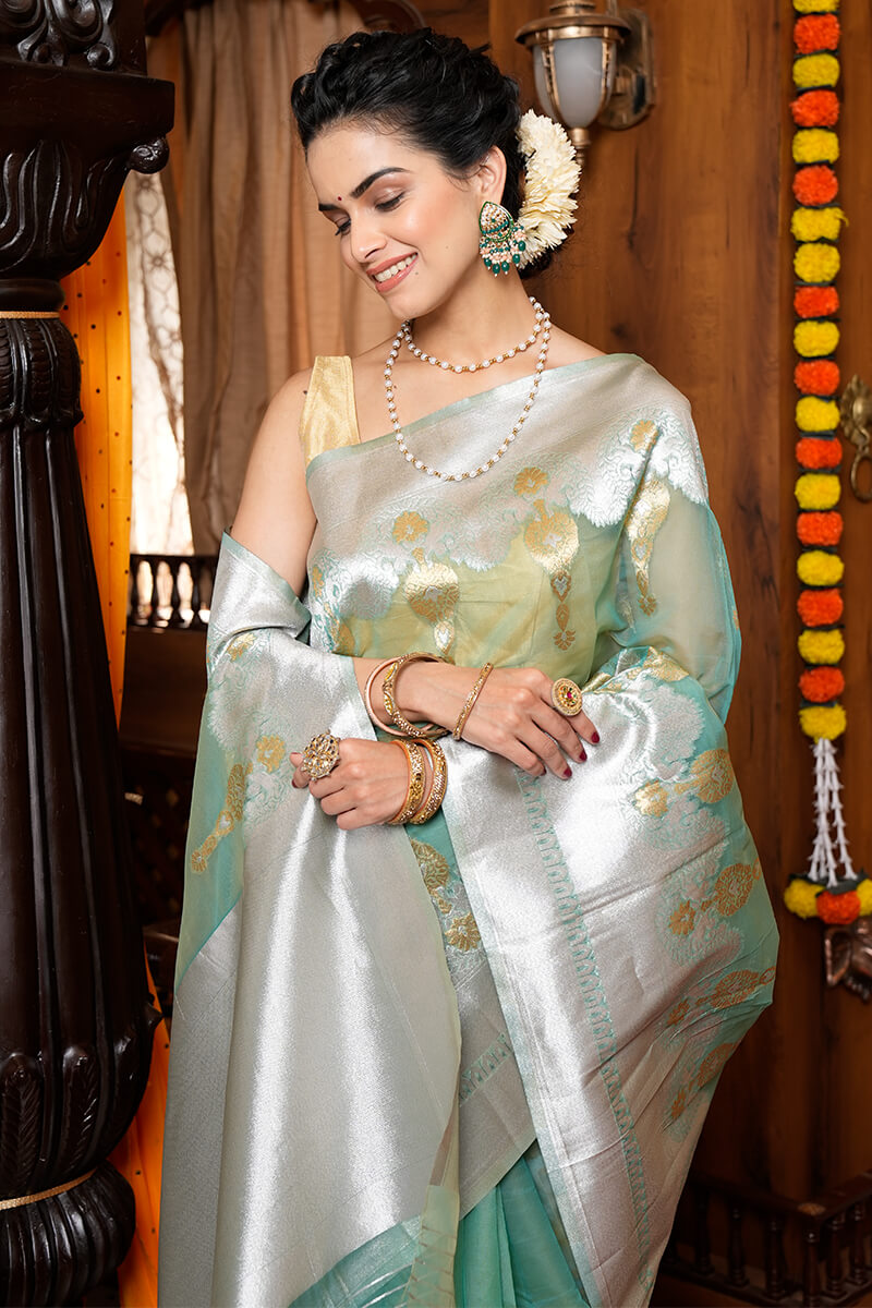 Tremendous Sea Green Organza Silk Saree With Quintessential Blouse Piece
