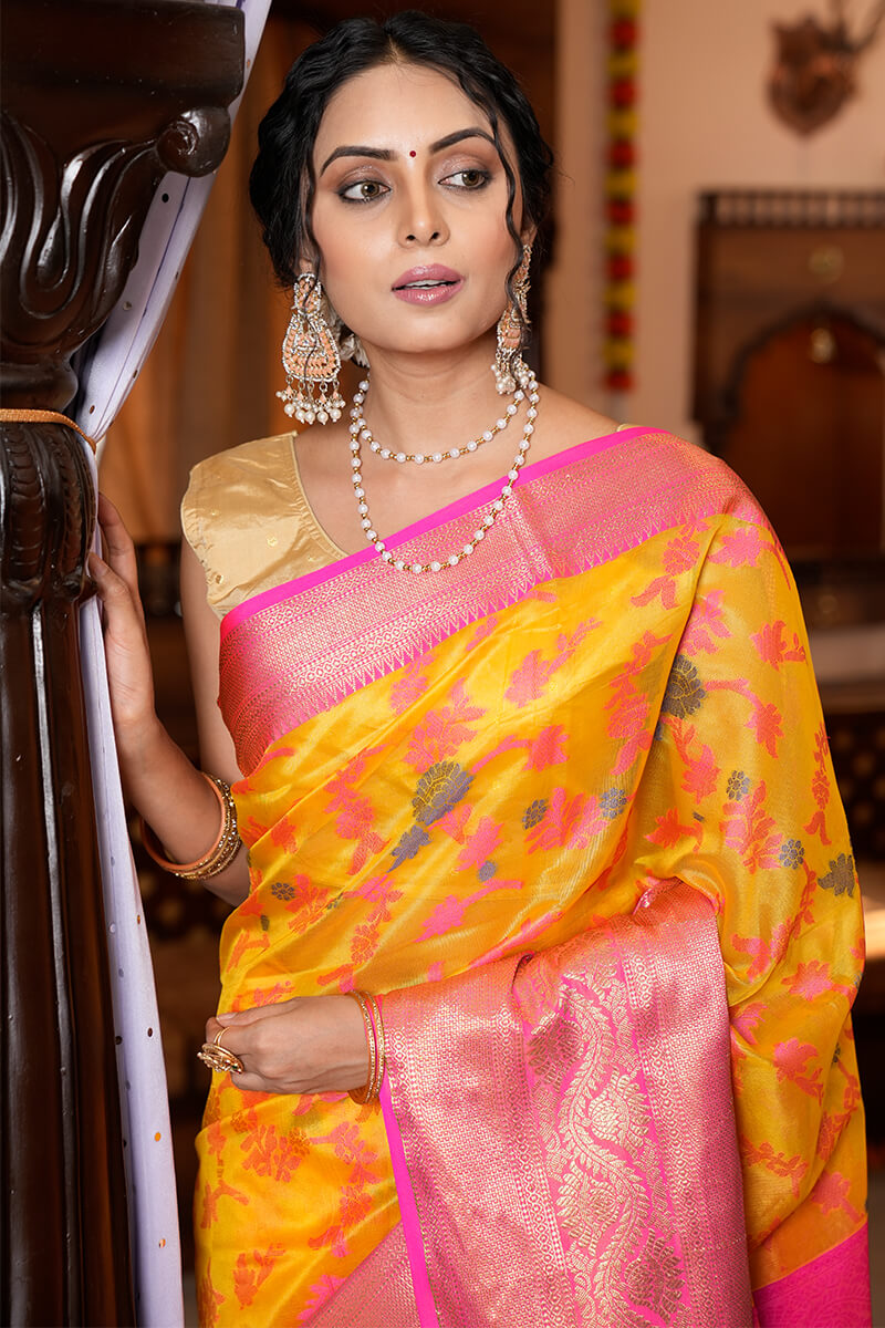 Magnetic Yellow Organza Silk Saree With Snappy Blouse Piece