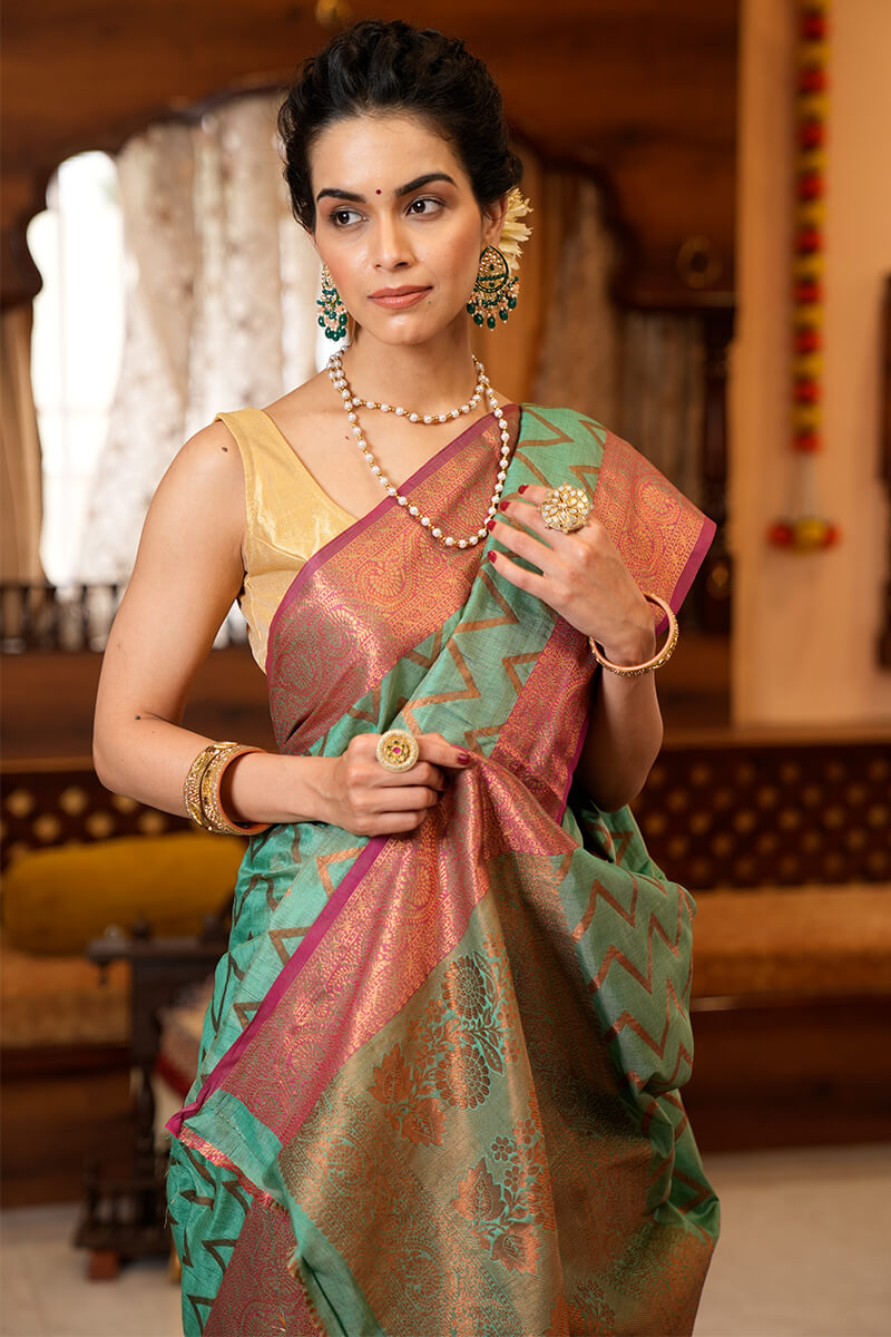 Invaluable Sea Green Soft Banarasi Silk Saree With Jazzy Blouse Piece