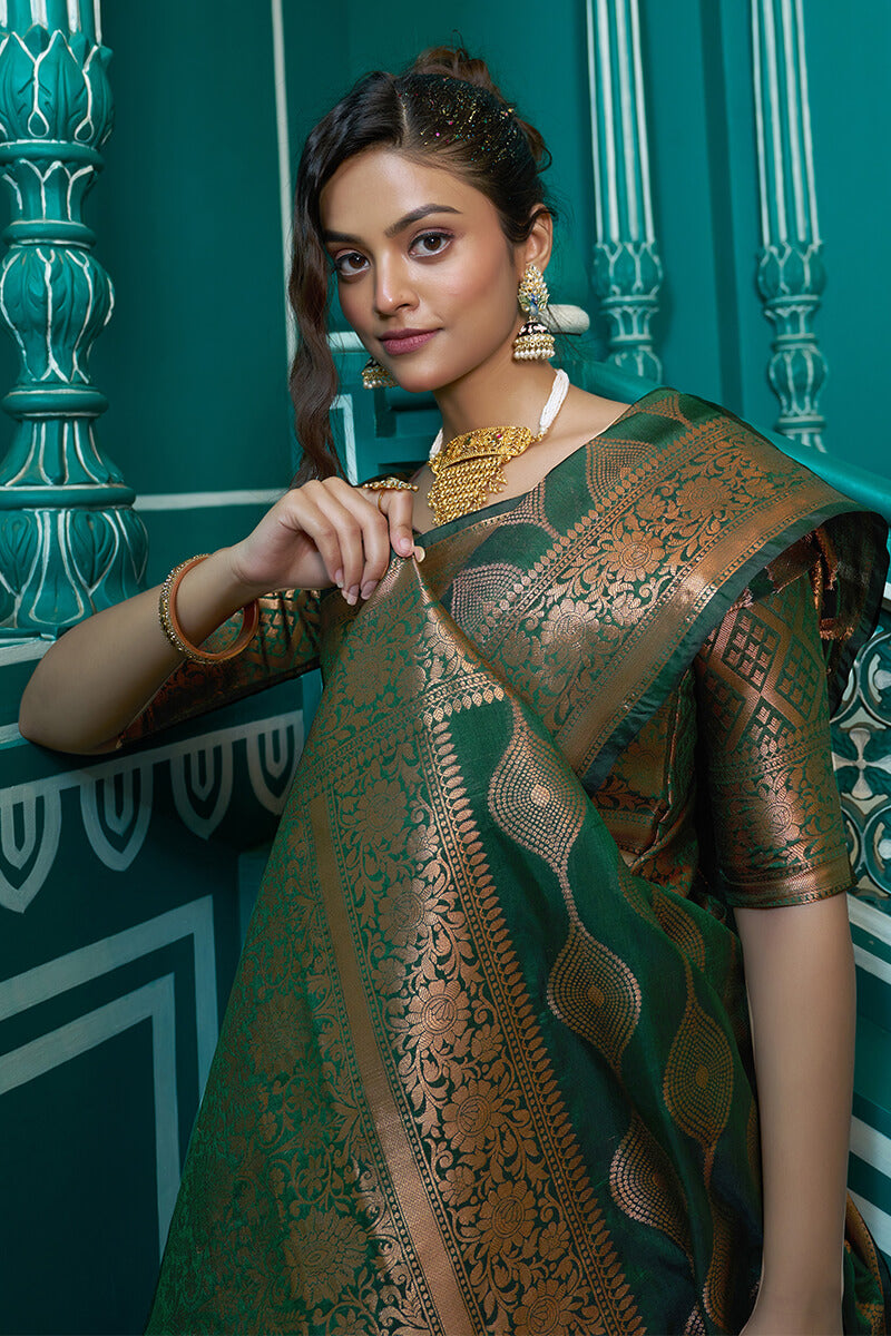 Confounding Maroon Soft Banarasi Silk Saree With Gossamer Blouse Piece