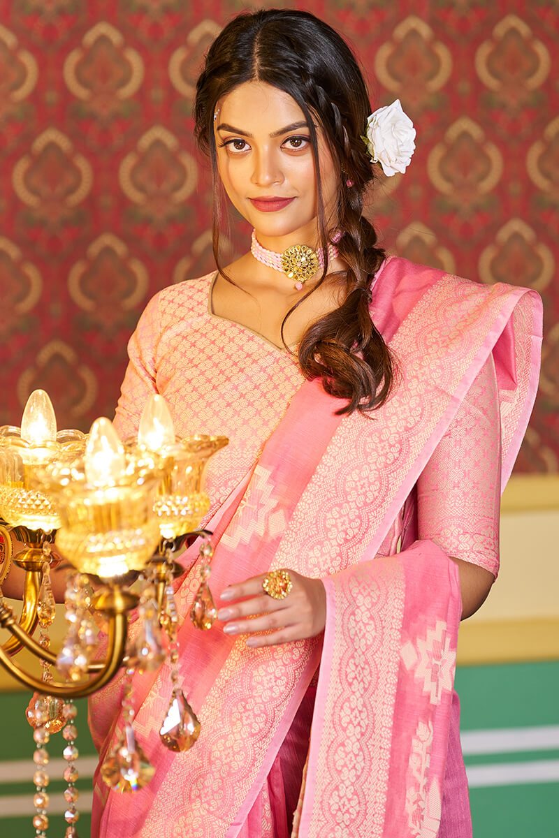 Amiable Pink Linen Silk Saree With Snazzy Blouse Piece