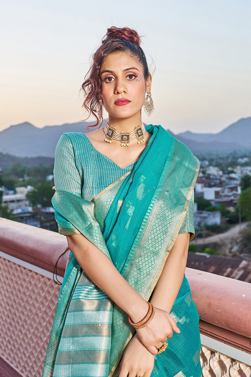 Bewitching Turquoise Soft Silk Saree with Conflate Blouse Piece