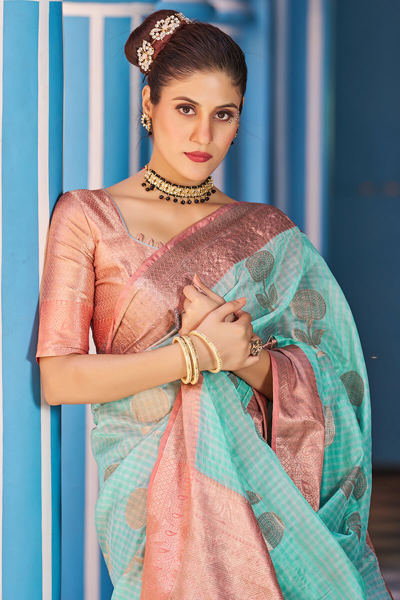 Incredible Sea Green Organza Silk Saree With Fantabulous Blouse Piece