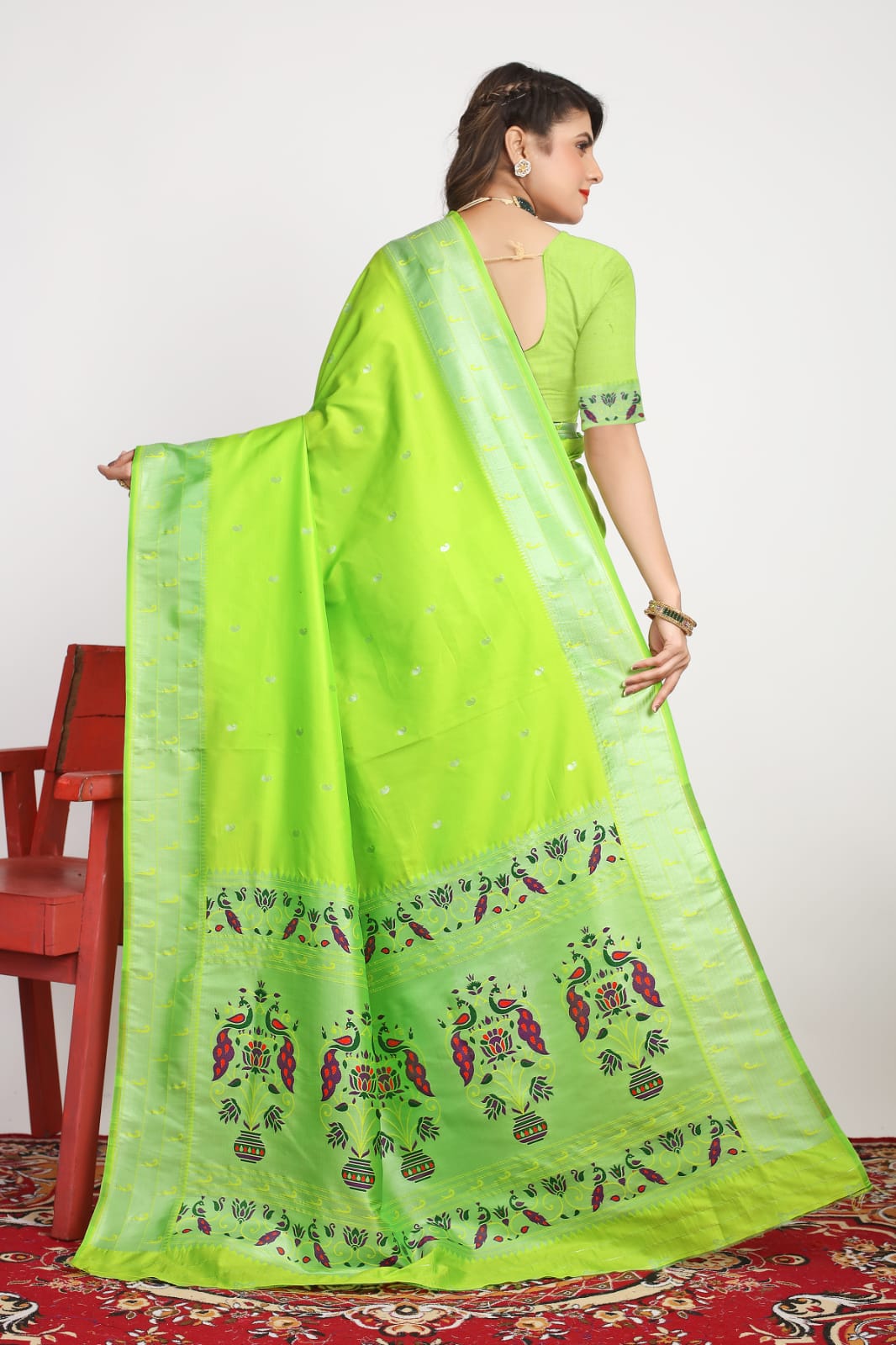 Deserving Parrot Paithani Silk Saree With Glowing Blouse Piece