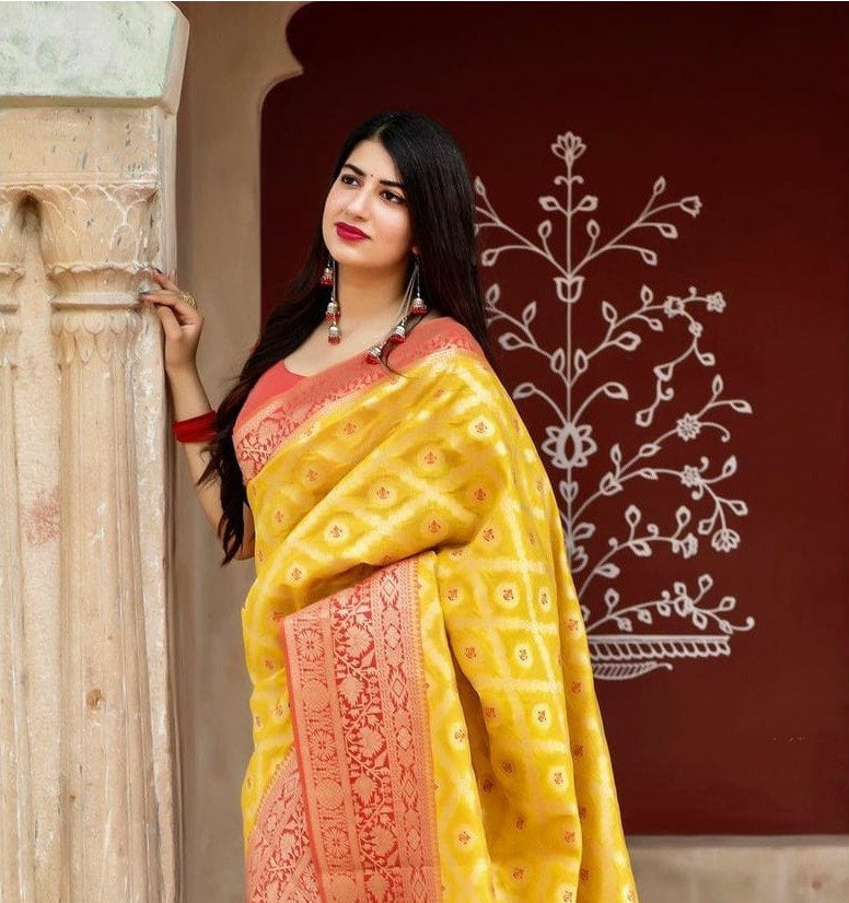 Invaluable Yellow Soft Silk Saree With Designer Blouse Piece